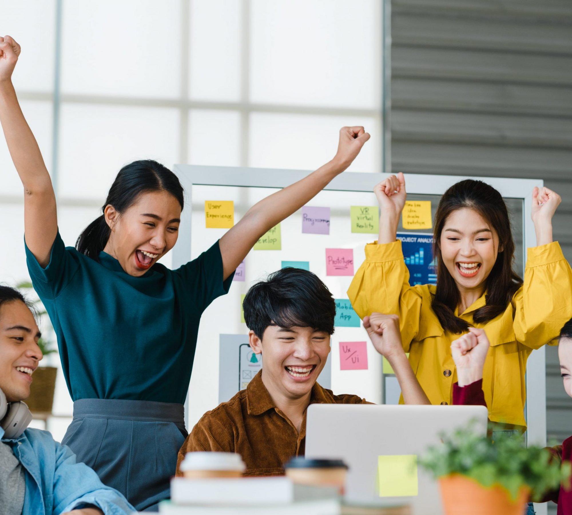 group-asia-young-creative-people-smart-casual-wear-discussing-business-celebrate-giving-five-after-dealing-feeling-happy-signing-contract-agreement-office-coworker-teamwork-concept-min